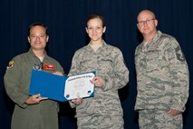 U.S. Air Force Reserve Col. Anthony Brusca, interim commander for the 913th Airlift Group, Tech. Sgt. Leslie Alonso-Welch, aviation resource manager, 327th Airlift Squadron and Chief Master Sgt. Paul Stewart, superintendent, 913 AG, pose for a photo during a Commander’s Call at Little Rock Air Force Base, Ark., Nov. 6, 2016. Alonso-Welch received her Community College of the Air Force Associates Degree in Aviation Management. Colonel Brusca also recognized nine additional Airmen for personal achievements. (U.S. Air Force photo by Master Sgt. Jeff Walston/Released)