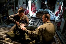 U.S. Air Force Reserve Tech. Sgt. Aja Ledbetter and Master Sgt. James Crawford, loadmasters assigned to the 327th Airlift Squadron, prepare a drogue chute on a C-130J Super Hercules during the Unit Assembly Training weekend, Nov. 5, 2016, at Little Rock Air Force Base, Ark. Training missions on UTA weekends fine tunes Airmen’s skills and prepare them to deploy in support of the Air Force’s worldwide mission. (U.S. Air Force photo by Master Sgt. Jeff Walston/Released)