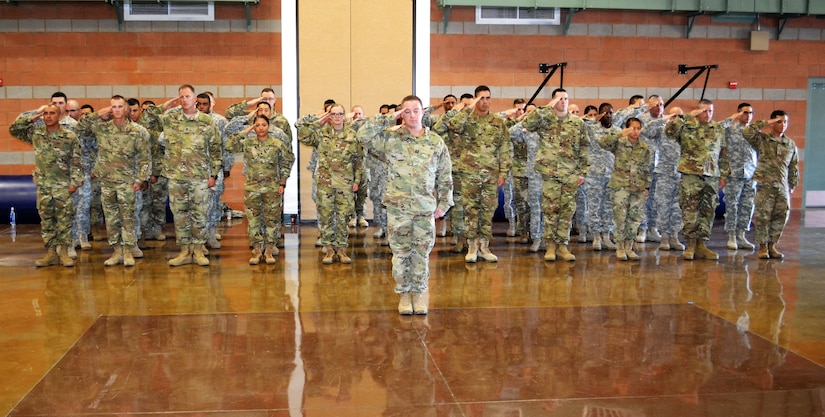 Capt. Colin Donohue, 314th Combat Sustainment Support Battalion HHC commander, and his troops salute the colors during a deployment ceremony at the Nevada National Guard Armory November 5. The 314th CSSB will be deploying to Iraq for Operation Inherent Resolve to support war fighters in that area of operation. Operation Inherent Resolve is the U.S. military's operational name for the military intervention against the Islamic State of Iraq and the Levant, including both the campaign in Iraq and the campaign in Syria.