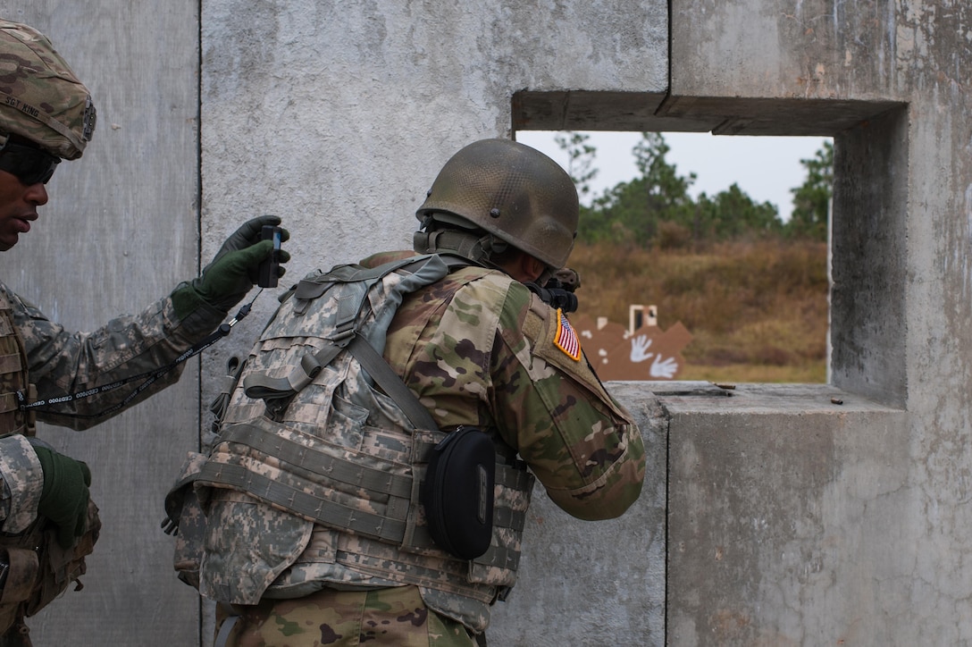 Sgt. Joseph Hall, with the 310th Psychological Operation Company and the U.S. Army Reserve Combat Marksmanship Program, engages targets on the third day of the U.S. Army Forces Command Weapons Marksmanship Competition Nov. 9, 2016, at Fort Bragg, N.C. The four-day FORSCOM competition features marksmen from the U.S. Army, U.S. Army Reserve, and the National Guard in events for the M9 pistol, the M4A1 rifle and the M249 SAW, or Squad Automatic Weapon, to recognize Soldiers who are beyond expert marksmen. The multi-tiered events challenge the competitors' ability to accurately and quickly engage targets in a variety of conditions and environments. (U.S. Army photo by Timothy L. Hale/Released)