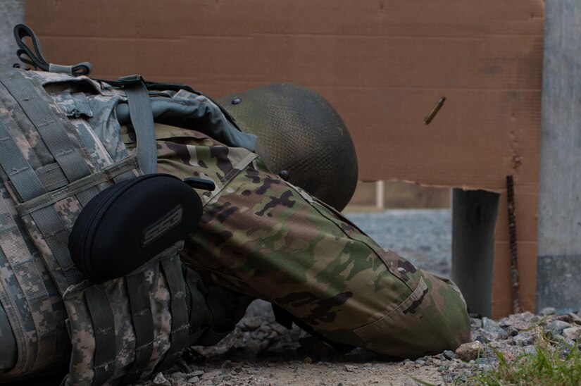 Sgt. Joseph Hall, with the 310th Psychological Operation Company and the U.S. Army Reserve Combat Marksmanship Program, engages targets on the third day of the U.S. Army Forces Command Weapons Marksmanship Competition Nov. 9, 2016, at Fort Bragg, N.C. The four-day FORSCOM competition features marksmen from the U.S. Army, U.S. Army Reserve, and the National Guard in events for the M9 pistol, the M4A1 rifle and the M249 SAW, or Squad Automatic Weapon, to recognize Soldiers who are beyond expert marksmen. The multi-tiered events challenge the competitors' ability to accurately and quickly engage targets in a variety of conditions and environments. (U.S. Army photo by Timothy L. Hale/Released)