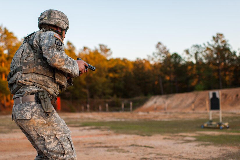 Staff Sgt. Thomas Walsh, with the 744th Engineer Company, 321st Engineer Battalion, engages moving targets in the novice category on the third day of the U.S. Army Forces Command Weapons Marksmanship Competition Nov. 9, 2016, at Fort Bragg, N.C. The four-day FORSCOM competition features marksmen from the U.S. Army, U.S. Army Reserve, and the National Guard in events for the M9 pistol, the M4A1 rifle and the M249 SAW, or Squad Automatic Weapon, to recognize Soldiers who are beyond expert marksmen. The multi-tiered events challenge the competitors' ability to accurately and quickly engage targets in a variety of conditions and environments. (U.S. Army photo by Timothy L. Hale/Released)