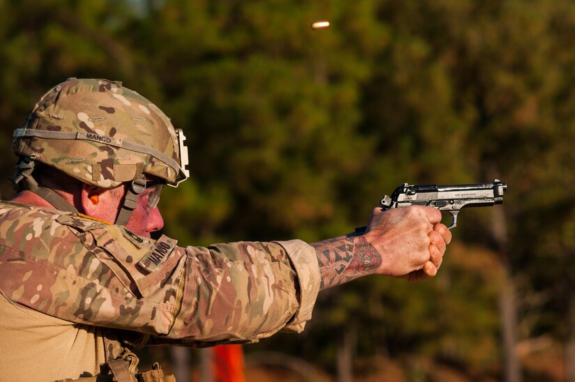 Master Sgt. Robert Mango, with the 9th Mission Support Command and the U.S. Army Reserve Combat Marksmanship Program, engages moving targets on the third day of the U.S. Army Forces Command Weapons Marksmanship Competition Nov. 9, 2016, at Fort Bragg, N.C. The four-day FORSCOM competition features marksmen from the U.S. Army, U.S. Army Reserve, and the National Guard in events for the M9 pistol, the M4A1 rifle and the M249 SAW, or Squad Automatic Weapon, to recognize Soldiers who are beyond expert marksmen. The multi-tiered events challenge the competitors' ability to accurately and quickly engage targets in a variety of conditions and environments. (U.S. Army photo by Timothy L. Hale/Released)