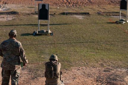 Master Sgt. Robert Mango, with the 9th Mission Support Command and the U.S. Army Reserve Combat Marksmanship Program, engages moving targets on the third day of the U.S. Army Forces Command Weapons Marksmanship Competition Nov. 9, 2016, at Fort Bragg, N.C. The four-day FORSCOM competition features marksmen from the U.S. Army, U.S. Army Reserve, and the National Guard in events for the M9 pistol, the M4A1 rifle and the M249 SAW, or Squad Automatic Weapon, to recognize Soldiers who are beyond expert marksmen. The multi-tiered events challenge the competitors' ability to accurately and quickly engage targets in a variety of conditions and environments. (U.S. Army photo by Timothy L. Hale/Released)