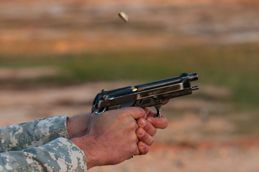 M9 pistol shell casings are ejected during the third day of the U.S. Army Forces Command Weapons Marksmanship Competition Nov. 9, 2016, at Fort Bragg, N.C. The four-day FORSCOM competition features marksmen from the U.S. Army, U.S. Army Reserve, and the National Guard in events for the M9 pistol, the M4A1 rifle and the M249 SAW, or Squad Automatic Weapon, to recognize Soldiers who are beyond expert marksmen. The multi-tiered events challenge the competitors' ability to accurately and quickly engage targets in a variety of conditions and environments. (U.S. Army photo by Timothy L. Hale/Released)