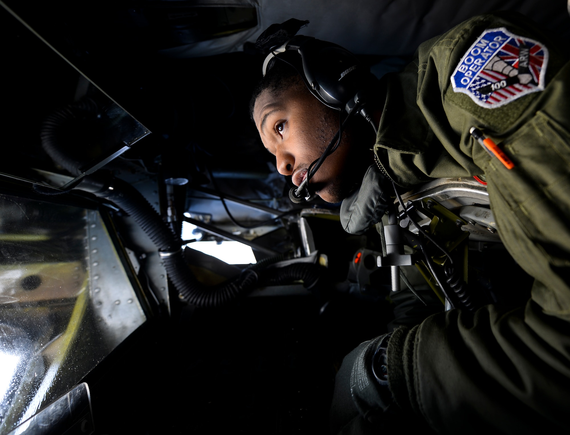 U.S. Air Force Senior Airman Kendall Bryant, 351st Air Refueling Squadron boom operator, looks through a window before aerial refueling during Exercise Tonnerre Lighting Nov. 9, 2016, over the Mediterranean Sea. The exercise was a combined endeavor between U.S., U.K. and French air forces to train for real world operations. RAF Mildenhall, England, regularly trains with allied armed forces to help strengthen partnerships and standardize training. (U.S. Air Force photo by Staff Sgt. Micaiah Anthony)