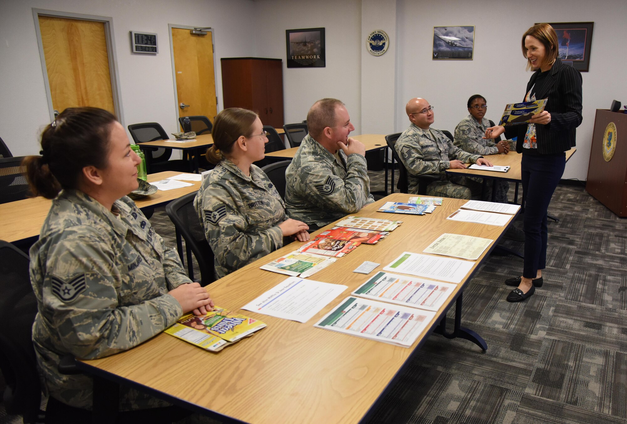 Joy Schaubhut, 81st Aerospace Medicine Squadron health promotion program coordinator, reviews nutrition labels with Better Body. Better Life. class attendees at the Professional Development Center Nov. 9, 2016, on Keesler Air Force Base, Miss. The program is designed to help individuals lose and maintain their weight and enjoy an overall healthy lifestyle. Classes are currently offered each quarter depending on participation. For more information, call 228-376-3171. (U.S. Air Force photo by Kemberly Groue/Released)