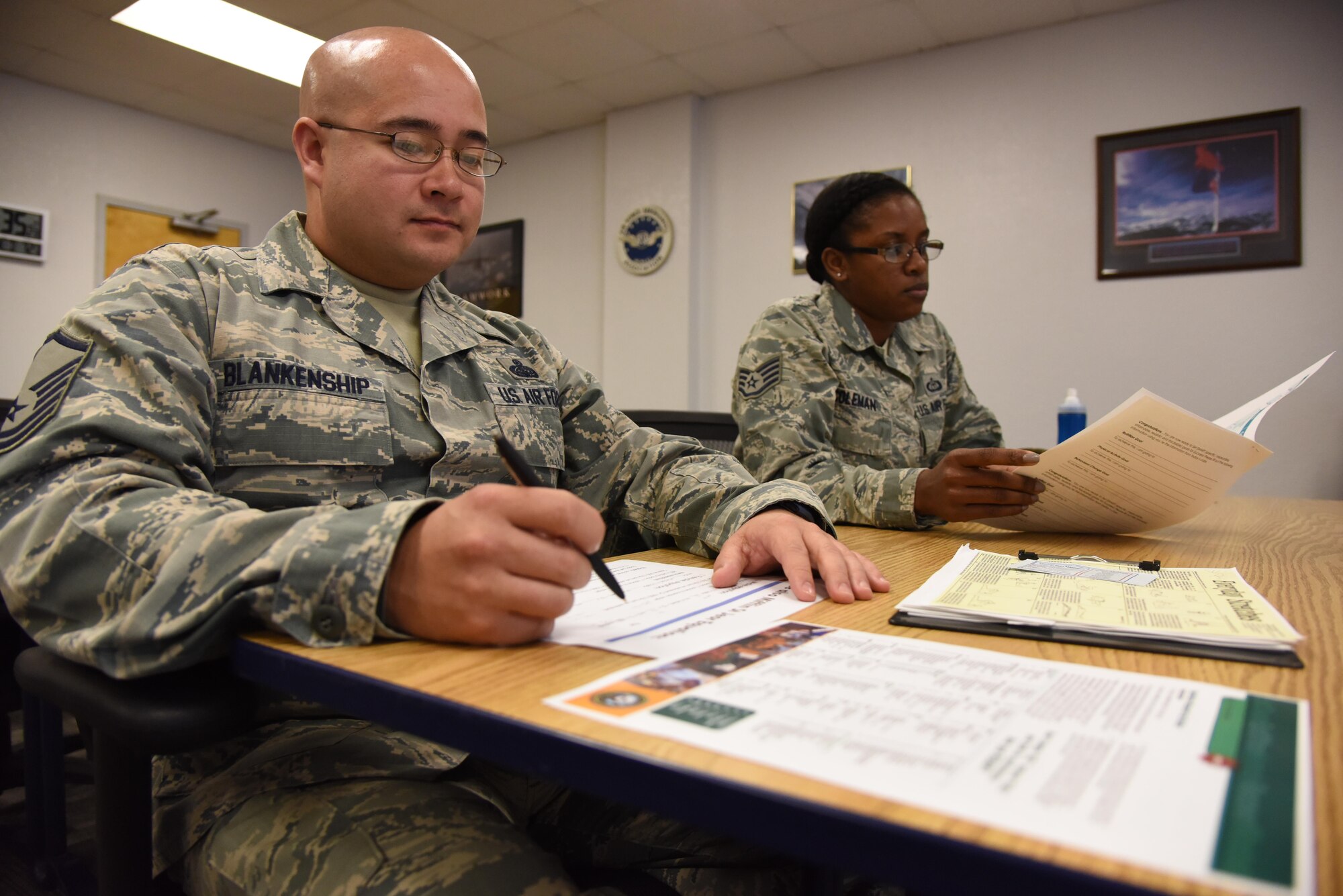 Master Sgt. William Blankenship, 338th Training Squadron instructor, and Staff Sgt. Tiffany Coleman, 335th TRS instructor, reviews dietary plans during a Better Body. Better Life. class at the Professional Development Center Nov. 9, 2016, on Keesler Air Force Base, Miss. The program is designed to help individuals lose and maintain their weight and enjoy an overall healthy lifestyle. Classes are currently offered each quarter depending on participation. For more information call 228-376-3171. (U.S. Air Force photo by Kemberly Groue/Released)