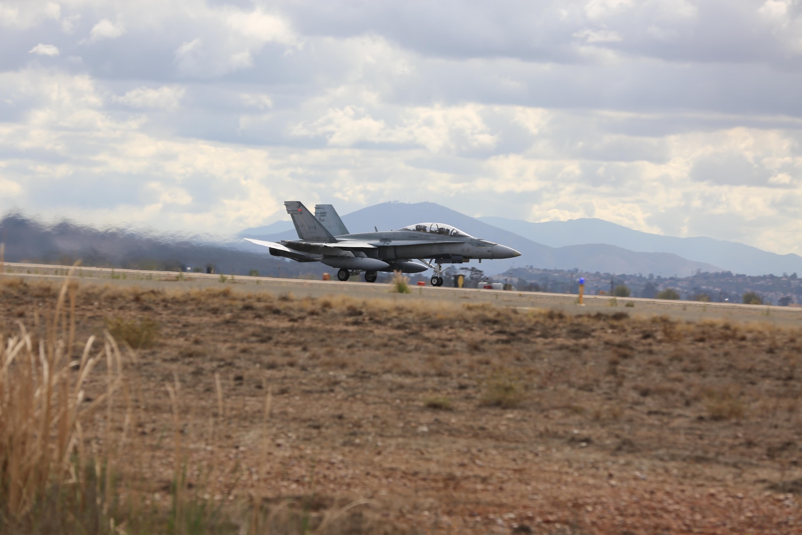 Service members with 4 Wing, Royal Canadian Air Force, conduct exercise PUMA STRIKE with 24 CF-188 Hornet fighter aircraft board Marine Corps Air Station Miramar, Calif., Oct. 31. Twice a year, 410 Tactical Fighter (Operational Training) Squadron deploys to locations in the southern United States to conduct fighter training operations. (U.S. Marine Corps photo by Lance Cpl. Jacob Pruitt/Released)