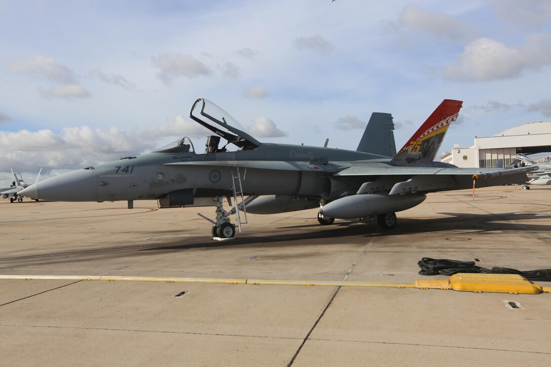 Service members with 4 Wing, Royal Canadian Air Force, conduct exercise PUMA STRIKE with 24 CF-188 Hornet fighter aircraft board Marine Corps Air Station Miramar, Calif., Oct. 31. Twice a year, 410 Tactical Fighter (Operational Training) Squadron deploys to locations in the southern United States to conduct fighter training operations. (U.S. Marine Corps photo by Lance Cpl. Jacob Pruitt/Released)