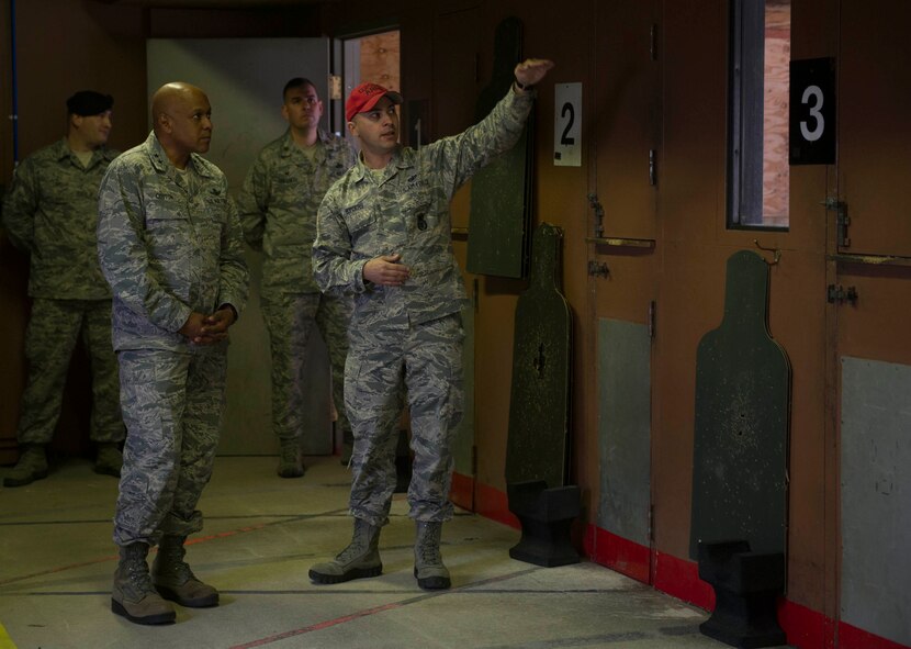 Maj. Gen. Anthony Cotton, 20th Air Force commander, is briefed by Tech. Sgt. Chris Borders, NCO in charge of Combat Arms Training and Maintenance, at Minot Air Force Base, N.D., Nov. 8, 2016. Cotton’s three-day visit included tours to several different units from both the 91st Missile Wing and 5th Bomb Wing. (U.S. Air Force photo/Senior Airman Apryl Hall)