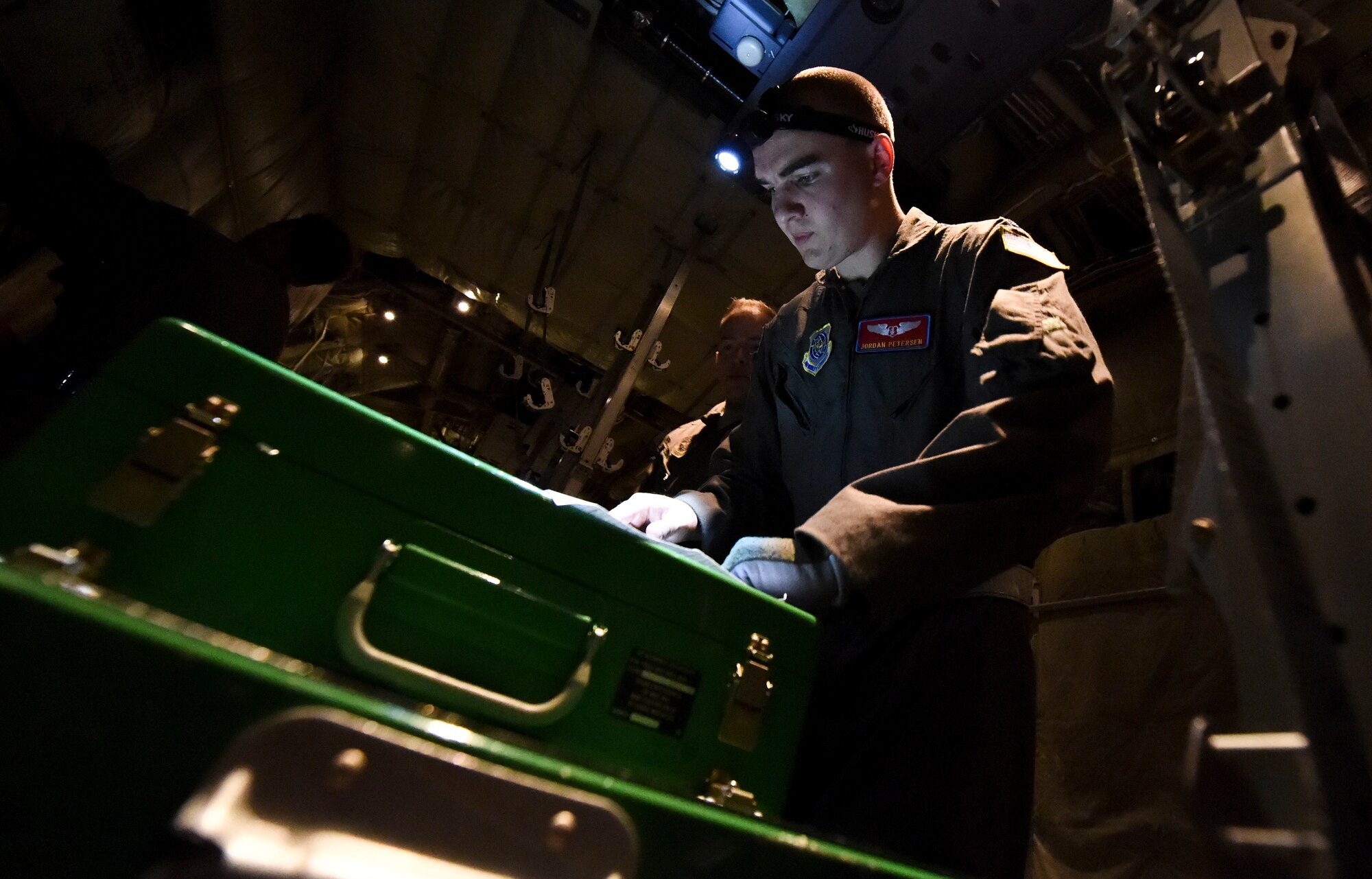 U.S. Air Force Capt. Jordan Petersen, 375th AES flight nurse, performs pre-flight checks during exercise Tropical Storm Greg, Nov. 8, 2016, at Little Rock Air Force Base, Ark. The exercise was an example of how the U.S. Air Force provides support to local, state and federal authorities by performing a key role during crisis situations. (U.S. Air Force photo by Senior Airman Stephanie Serrano)