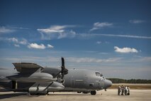 Airmen from the 71st Aircraft Maintenance Unit wait in front of an HC-130J Combat King II for a mission to kick-off during a rapid-rescue exercise, Nov. 2, 2016, at Tyndall Air Force Base, Fla. The exercise was designed to test the 347th Rescue Group’s ability to rapidly deploy, plan and execute rescue operations in combat environments. The exercise included HC-130J Combat King IIs, HH-60G Pave Hawks, C-17 Globemaster IIIs, A-10C Thunderbolt IIs, E-8C Joint Stars, pararescuemen and maintenance, intelligence and support personnel. (U.S. Air Force photo by Staff Sgt. Ryan Callaghan)
