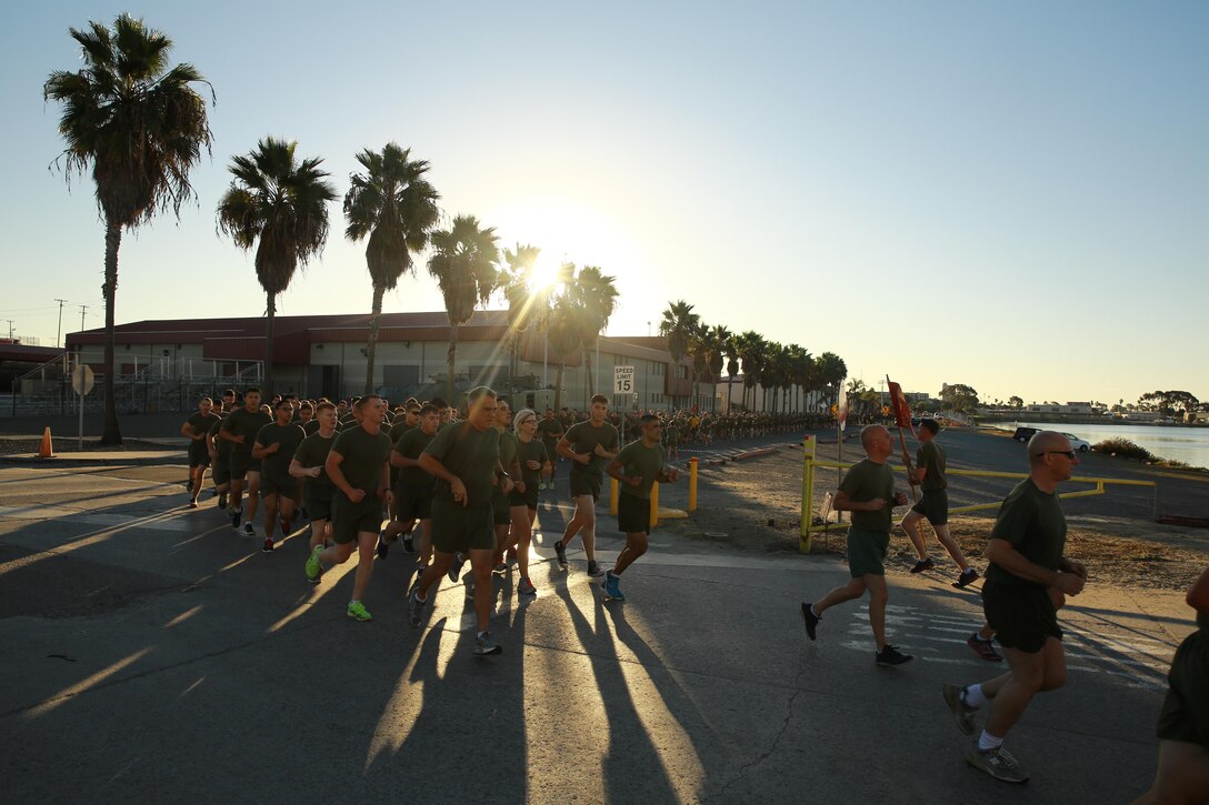 Marines and Sailors with I Marine Expeditionary Force conduct a motivational run at Marine Corps Base Camp Pendleton, Calif., Nov. 10, 2016. The motivational run was done in celebration of the 241st birthday of the United States Marine Corps. On Nov. 1, 1921, General John A. Lejeune, 13th Commandant of the Marine Corps, directed that Marines throughout the globe would celebrate their traditions on the Marine Corps Birthday, Nov. 10.  (U.S. Marine Corps photo by Pfc. Robert Bliss)