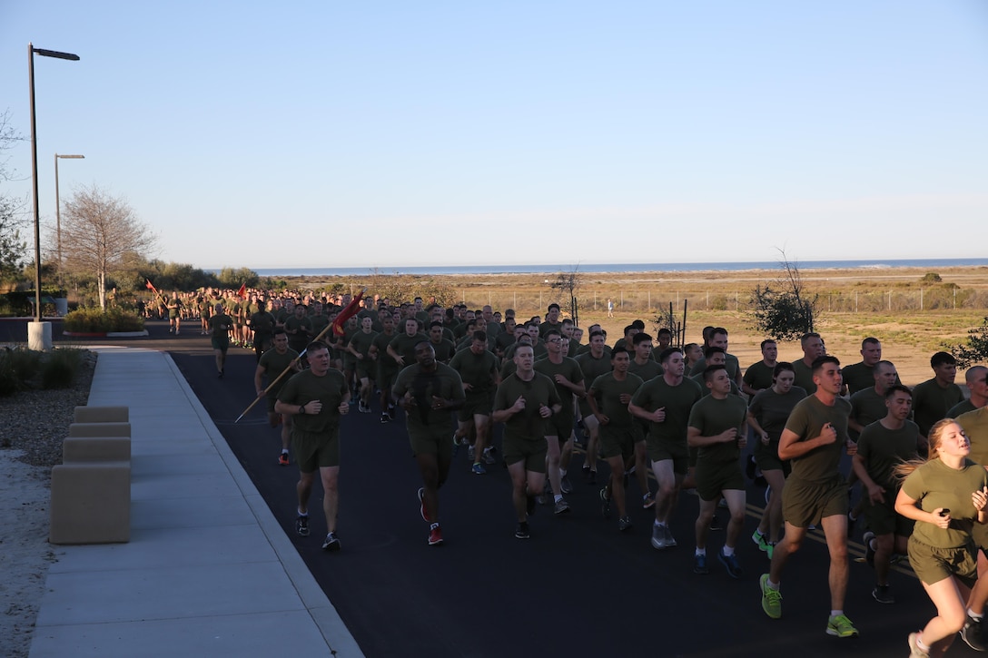 Marines and Sailors with I Marine Expeditionary Force conduct a motivational run at Marine Corps Base Camp Pendleton, Calif., Nov. 10, 2016. The motivational run was done in celebration of the 241st birthday of the United States Marine Corps. On Nov. 1, 1921, General John A. Lejeune, 13th Commandant of the Marine Corps, directed that Marines throughout the globe would celebrate their traditions on the Marine Corps Birthday, Nov. 10.  (U.S. Marine Corps photo by Pfc. Robert Bliss)