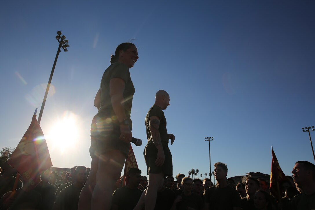 Col. Roberta Shea, commanding officer, I Marine Expeditionary Force Headquarters Group, and Sgt. Maj. David Wilson, sergeant major, I MHG, address Marines and Sailors after a motivational run at Marine Corps Base Camp Pendleton, Calif., Nov. 10, 2016. The motivational run was done in celebration of the 241st birthday of the United States Marine Corps. On Nov. 1, 1921, General John A. Lejeune, 13th Commandant of the Marine Corps, directed that Marines throughout the globe would celebrate their traditions on the Marine Corps Birthday, Nov. 10.  (U.S. Marine Corps photo by Pfc. Robert Bliss)