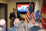 Defense Contract Management Agency Deputy Director James Russell delivers the opening address at the agency headquarters Veterans Day ceremony Nov. 7. The program was in honor of the sacrifice and service of the almost 5,400 veterans across the agency.