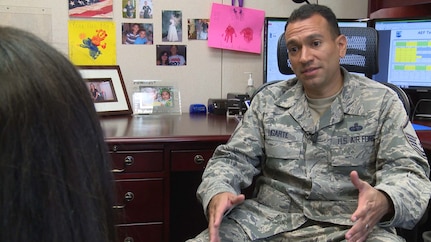 MSgt Joe Ugarte (right), readiness non-commissioned officer (NCO) assigned to the Military and Family Readiness Center at Joint Base San Antonio-Randolph, provides a client details about the Give Parents A Break (GPAB) program.  For the past 4-years, MSgt Ugarte has provided support to active duty and family members during the entire duration of deployments.
