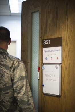 Capt. Justin Rossi, a Special Victims Counsel attorney stationed at Mountain Home Air Force Base, Idaho, enters his office at the 366th Fighter Wing Headquarters Nov. 9, 2016. The SVC provides representation and legal assistance for victims of sexual assault. (U.S. Air Force photo by 2nd Lt. Kevyn Stinett/Released)
