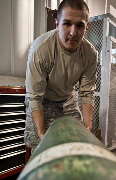 Senior Airman Derrick Pierce, 5th Maintenance Squadron electrical and environmental journeyman, removes a depleted gaseous oxygen bottle from a cart at Minot Air Force Base, N.D., Nov. 7, 2016. Electrical and environmental Airmen are responsible for managing all oxygen bottles used for hot gas purges on the B-52H Stratofortress’ liquid oxygen system. (U.S. Air Force photo/Airman 1st Class Jonathan McElderry)