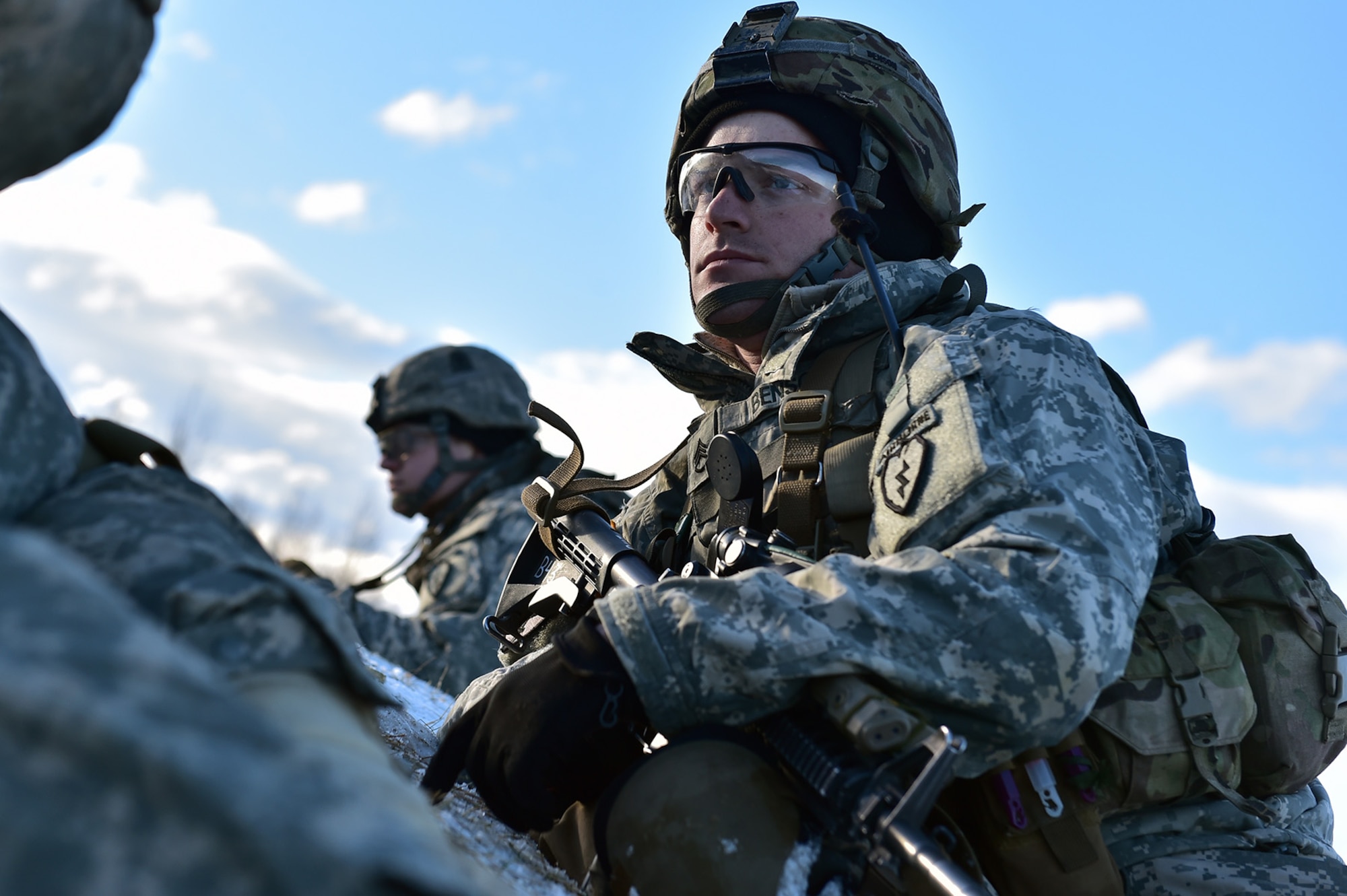 Army Staff Sgt. Bryan Benson, assigned to Baker Company, 3rd Battalion, 509th Parachute Infantry Regiment, 4th Infantry Brigade Combat Team (Airborne), 25th Infantry Division, U.S. Army Alaska, watches fellow paratroopers fire and maneuver while conducting live-fire and movement-to-contact operations on the Infantry Squad Battle Course at Joint Base Elmendorf-Richardson, Alaska, Nov. 8, 2016. The soldiers focused on core infantry skills such as fire team movement, communication, shifting fire, and once on the objective identifying and eliminating weapons caches and treating and evacuating casualties. 