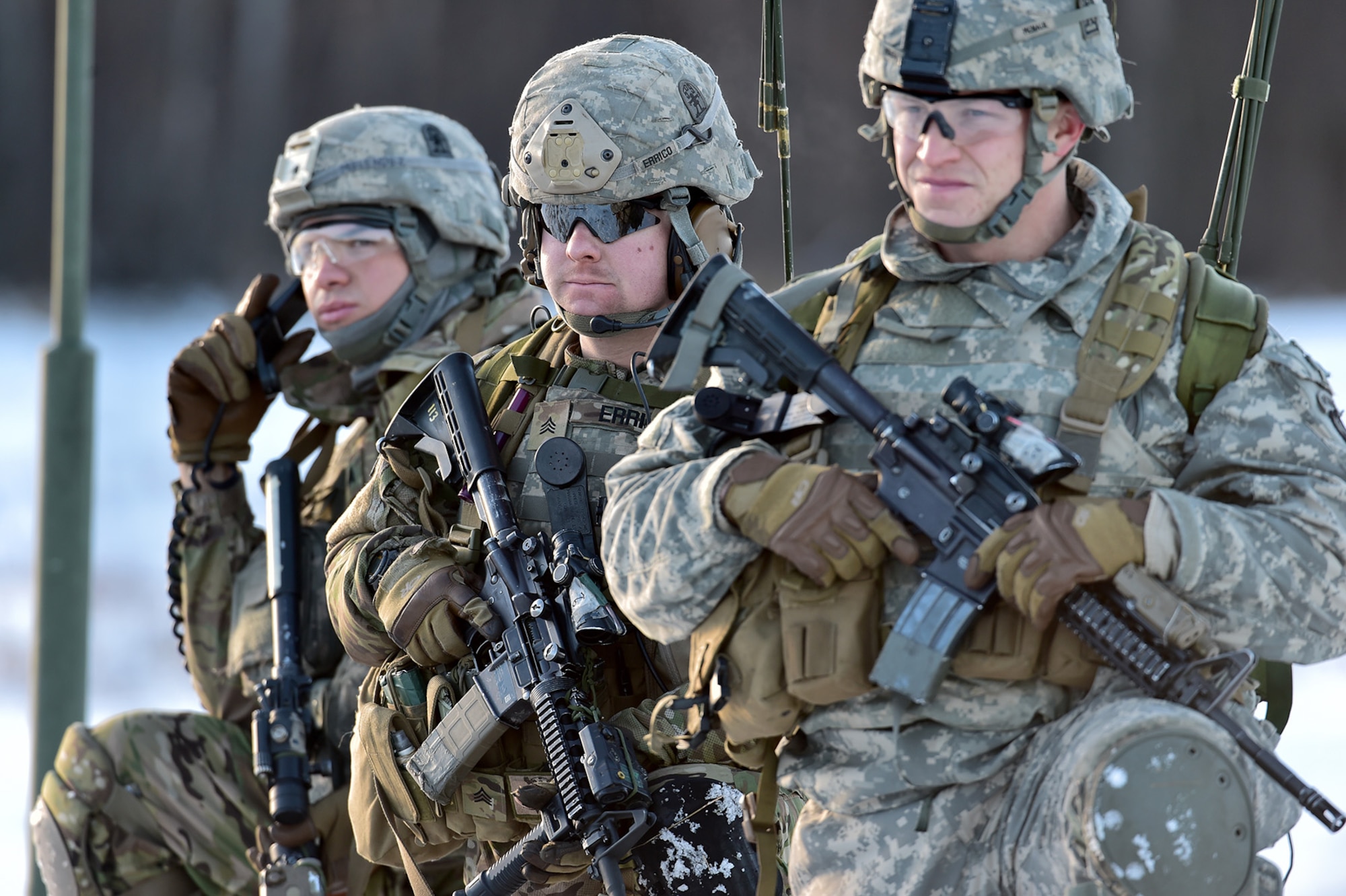 Army Sgt. Taylor Errico, center, assigned to Baker Company, 3rd Battalion, 509th Parachute Infantry Regiment, 4th Infantry Brigade Combat Team (Airborne), 25th Infantry Division, U.S. Army Alaska, guards a communications area with fellow paratroopers during live-fire and movement-to-contact operations on the Infantry Squad Battle Course at Joint Base Elmendorf-Richardson, Alaska, Nov. 8, 2016. The soldiers focused on core infantry skills such as fire team movement, communication, shifting fire, and once on the objective identifying and eliminating weapons caches and treating and evacuating casualties.