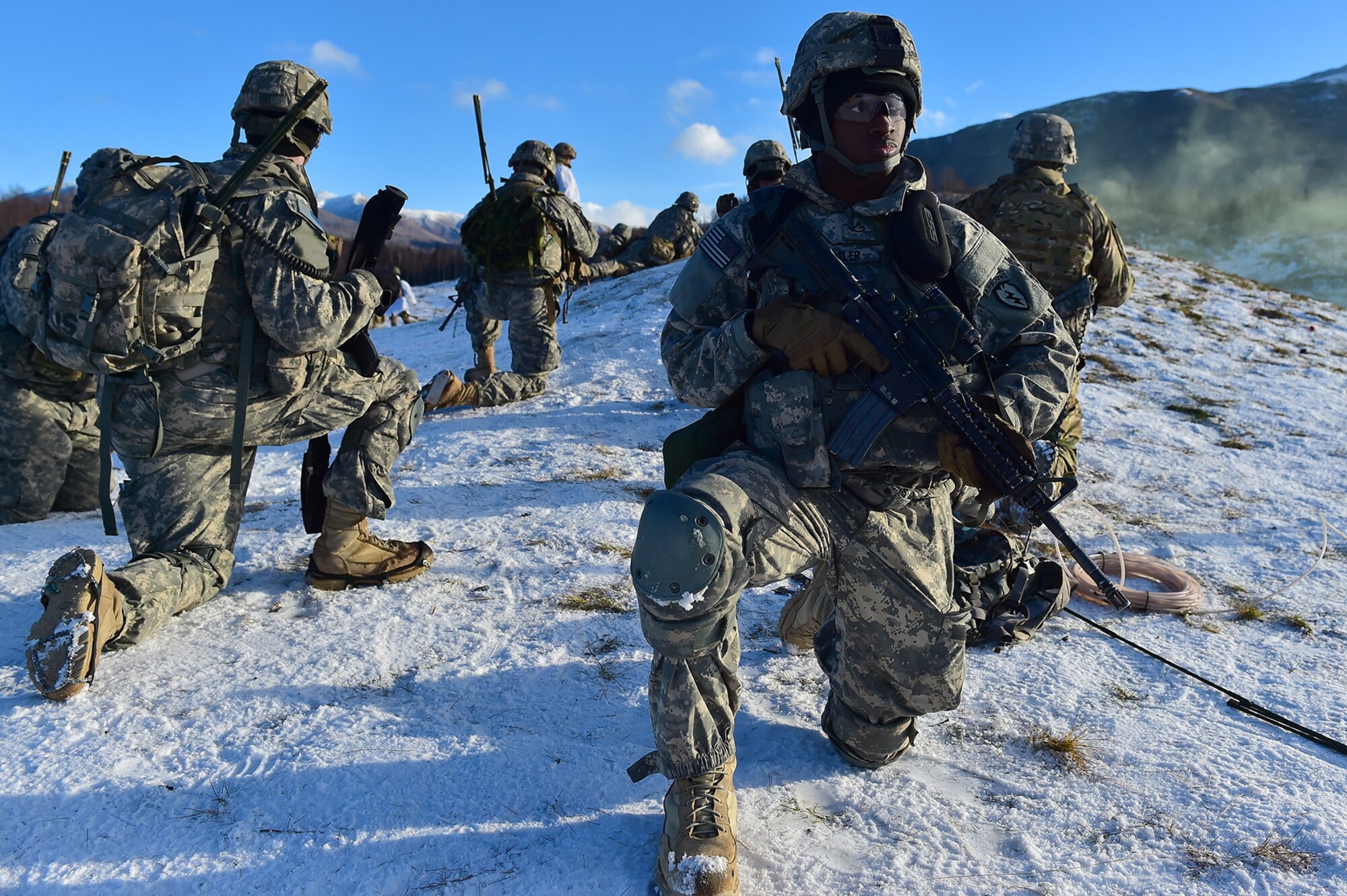 Army Pfc. Nathanquise Butler, assigned to Baker Company, 3rd Battalion, 509th Parachute Infantry Regiment, 4th Infantry Brigade Combat Team (Airborne), 25th Infantry Division, U.S. Army Alaska, provides security during live-fire and movement-to-contact operations on the Infantry Squad Battle Course at Joint Base Elmendorf-Richardson, Alaska, Nov. 8, 2016. The soldiers focused on core infantry skills such as fire team movement, communication, shifting fire, and once on the objective identifying and eliminating weapons caches and treating and evacuating casualties. 