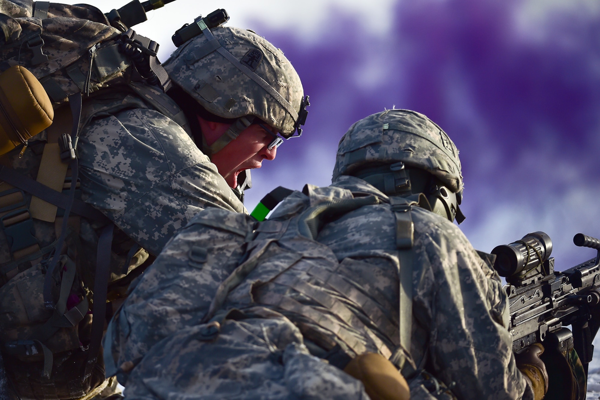 Army Staff Sgt. Samuel Hammer, assigned to Baker Company, 3rd Battalion, 509th Parachute Infantry Regiment, 4th Infantry Brigade Combat Team (Airborne), 25th Infantry Division, U.S. Army Alaska, screams orders to a soldier during live-fire and movement-to-contact operations on the Infantry Squad Battle Course at Joint Base Elmendorf-Richardson, Alaska, Nov. 8, 2016. The soldiers focused on core infantry skills such as fire team movement, communication, shifting fire, and once on the objective identifying and eliminating weapons caches and treating and evacuating casualties.  (U.S. Air Force photo/Justin Connaher)