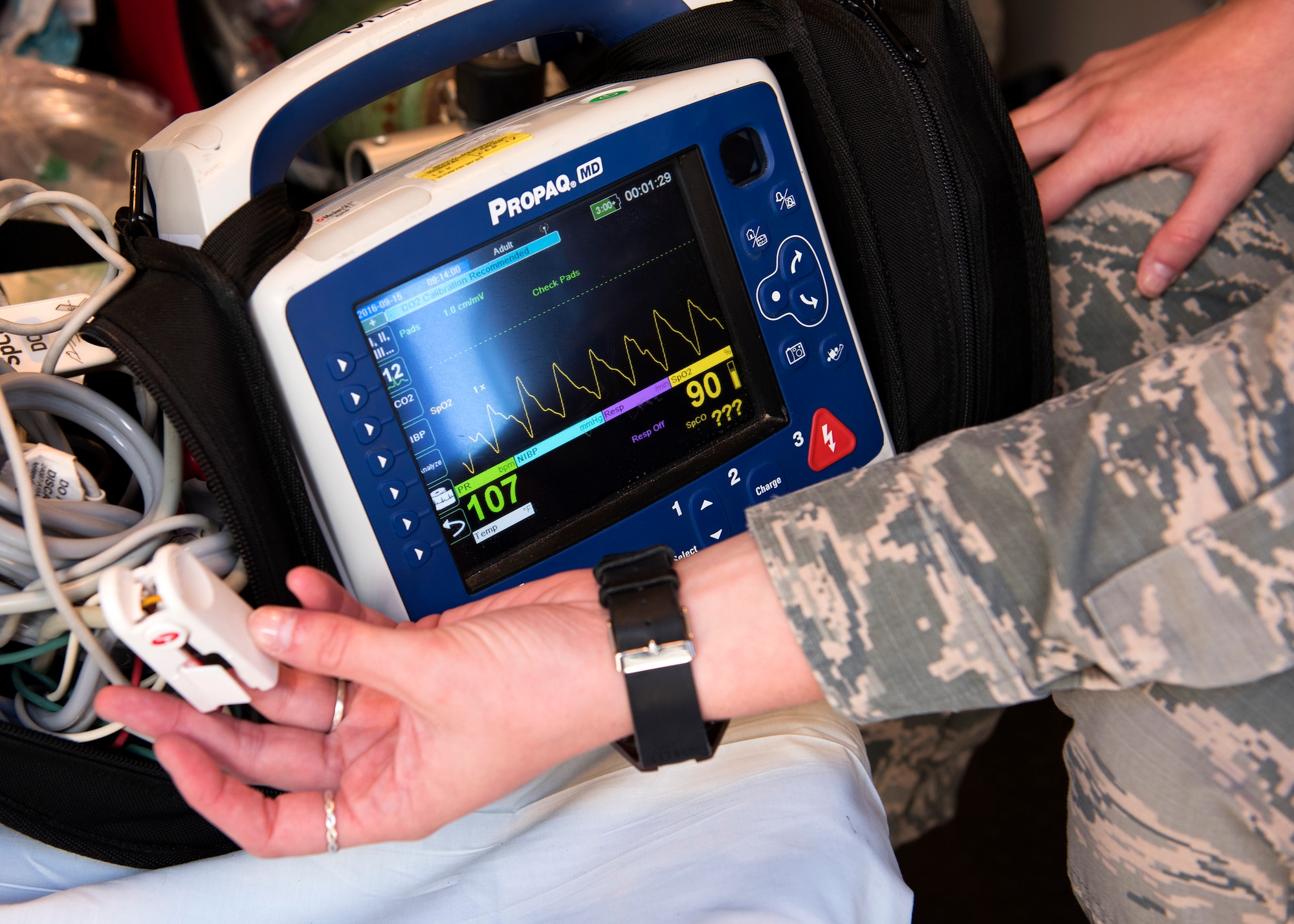 Airman 1st Class Shawn Regina McMahan, 92nd Medical Operations Squadron emergency medical technician, runs a diagnostic test of a mobile vitals monitor, Aug. 18, 2016, at Fairchild Air Force Base, Wash. Fairchild EMTs work with local civilian paramedic units to move stable patients to a local hospital. (U.S. Air Force photo/Airman 1st Class Ryan Lackey)