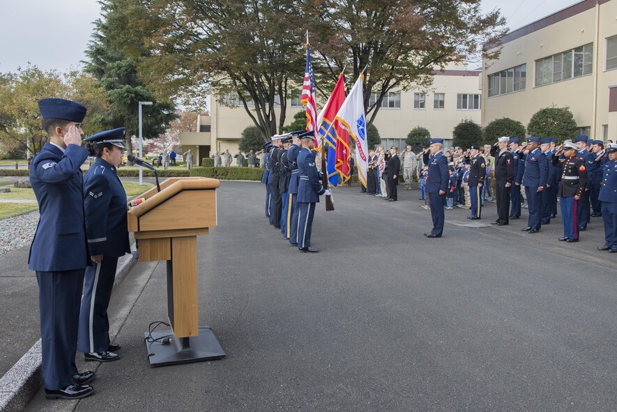 Members of Team Yokota attend a Veterans Day ceremony at Yokota Air Base, Japan, Nov. 10, 2016. Veterans day celebrates the service of all U.S. military veterans and coincides with Armistice Day and Remembrance Day which are celebrated in other countries, marking the anniversary of the end of World War I. (U.S. Air Force photo by Senior Airman David C. Danford/Released)