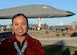 Staff Sgt. Anika Dexter, an individual protective equipment supervisor assigned to the 28th Logistics Readiness Squadron, poses for a photo in front of a B-1B Lancer at the South Dakota Air & Space Museum Nov. 10, 2016 at Ellsworth Air Force Base, S.D. Dexter, a Navajo Native American, is proud to honor her traditions and serve in the military defending her country, following in the same footsteps as her grandfathers. (U.S. Air Force photo by Senior Airman Anania Tekurio)