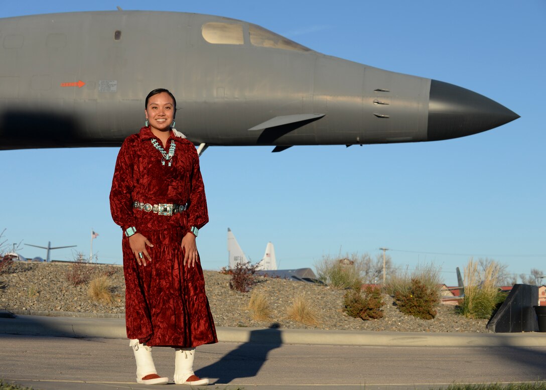 Staff Sgt. Anika Dexter, an individual protective equipment supervisor assigned to the 28th Logistics Readiness Squadron, poses in her traditional Navajo clothing for a photo in front of a B-1B Lancer at the South Dakota Air & Space Museum Nov. 10, 2016 at Ellsworth Air Force Base, S.D. Dexter, a Navajo Native American from the Southwest proudly displays her turquoise jewelry. (U.S. Air Force photo by Senior Airman Anania Tekurio)