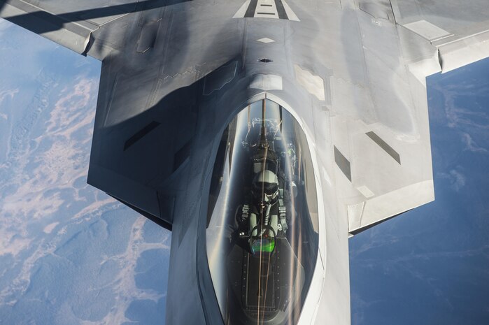 U.S. Air Force F-22 Raptors from Joint Base Elmendorf-Richardson, Alaska, receive fuel from a KC-135 Stratotanker flown by the 92nd Aerial Refueling Squadron from Fairchild Air Force Base, Wa., while both units participate in the Vigilant Shield 2017 Field Training Exercise 17 Oct., 2016, in the high arctic.
(U.S. Air Force Photo by Tech. Sgt. Gregory Brook)