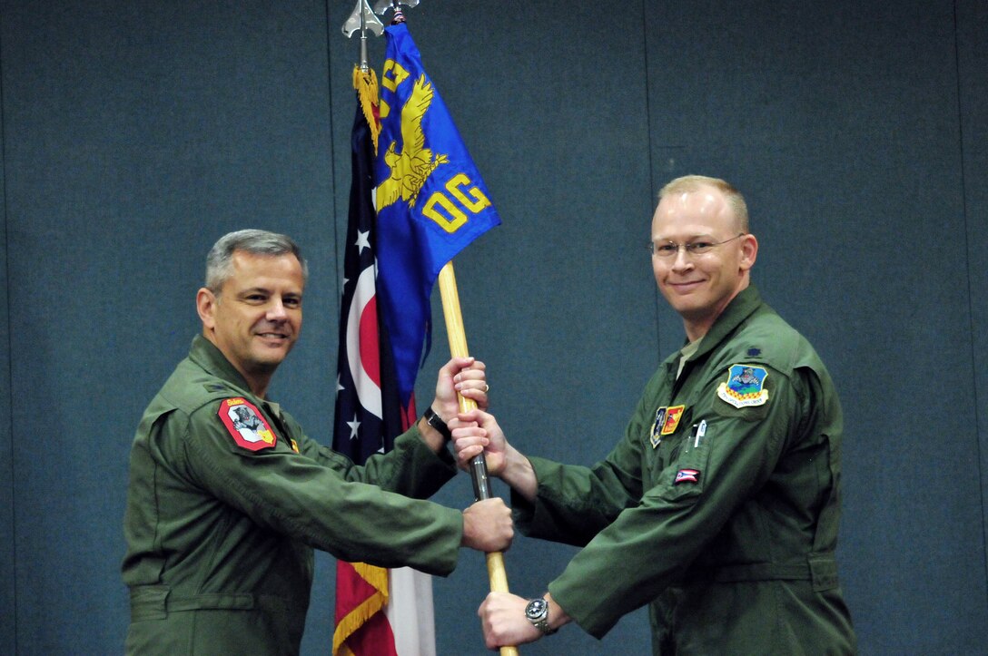 Lt. Col. Chad McGarry, the incoming 178th Operations Group  commander, assumed command during a ceremony at Springfield Air National Guard Base in Springfield, Ohio, Nov. 5, 2016. McGarry's 20 years of service in the Air Force prepared him for his new leadership role as the 178th OG commander. (U.S. National Guard photo by Airman 1st Class Rachel Simones)