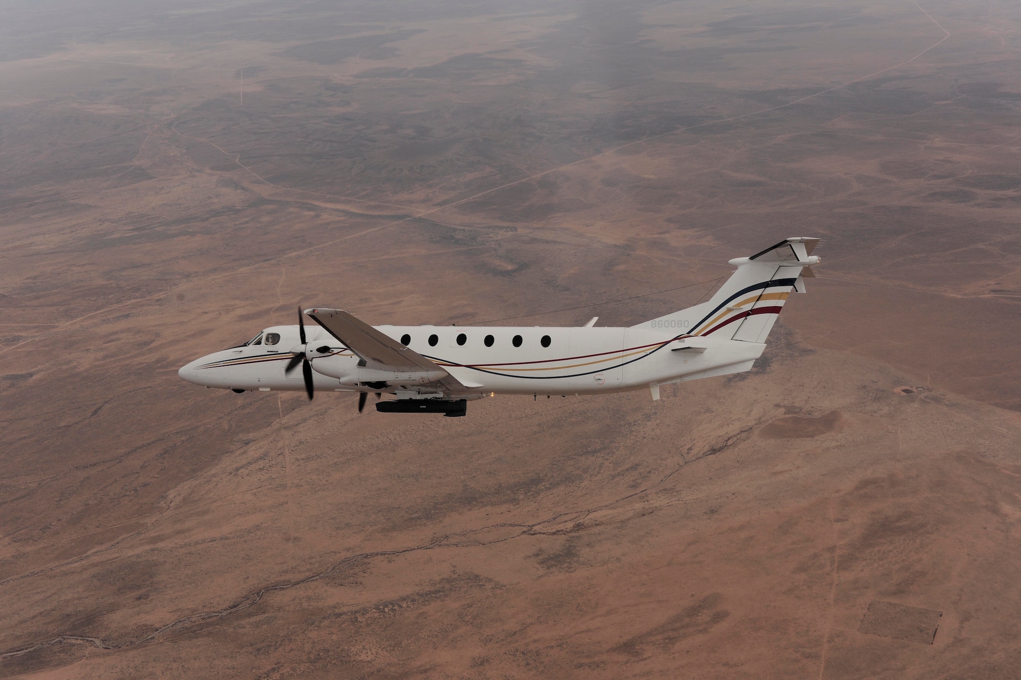 A C-12J equipped with a Sniper Advanced Targeting Pod was utilized by the 746th Test Squadron to perform air-to-ground targeting flight tests at Holloman Air Force Base, March 20. (Courtesy photo)