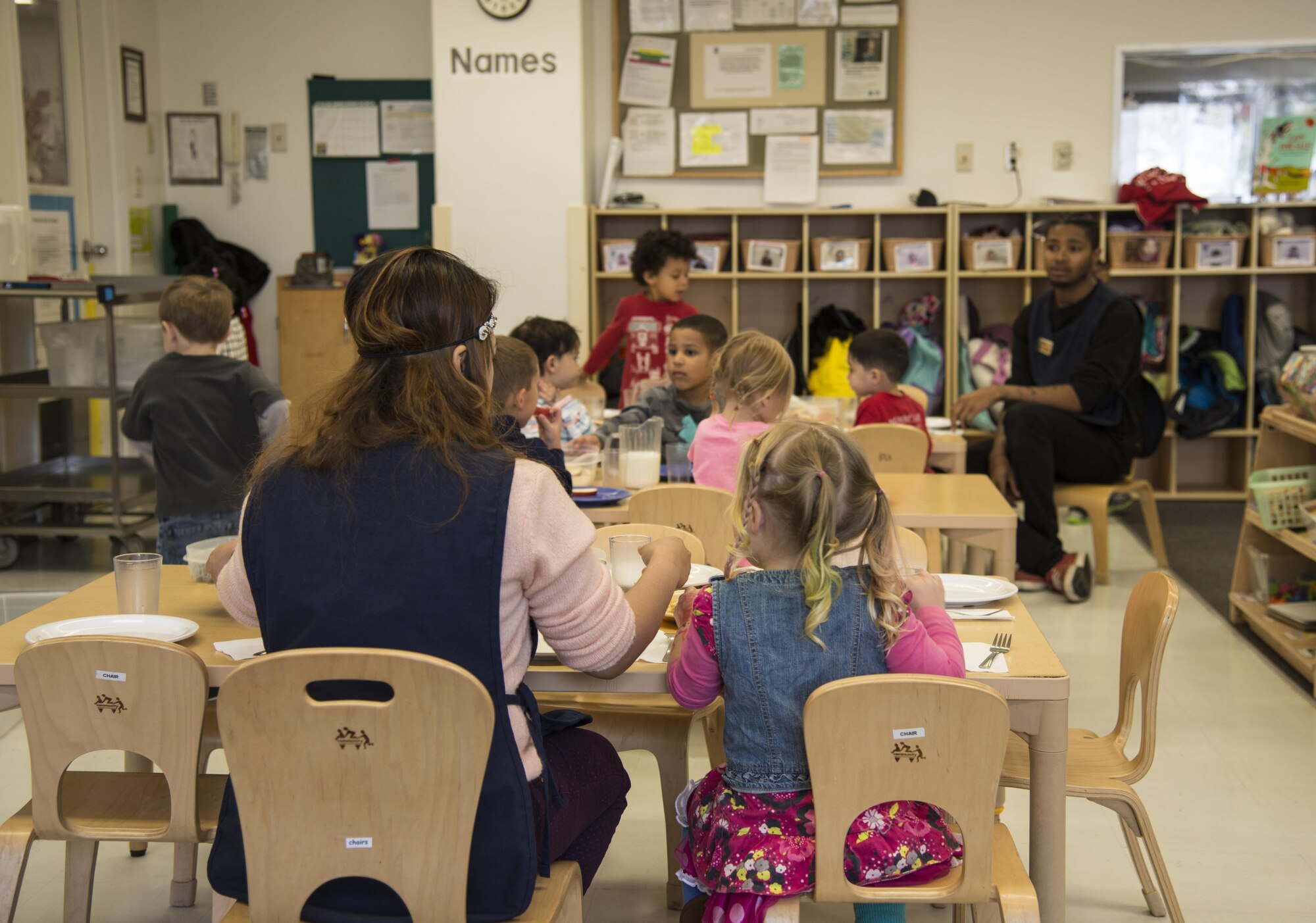 Children in a pre-school age class eat lunch at the 35th Force Support Squadron Yoiko Child Development Center, Nov. 2, 2016. Each day lunch is made in-house by the staff and ensures the children receive a balanced nutritional diet. (U.S. Air Force photo by Senior Airman Brittany A. Chase)