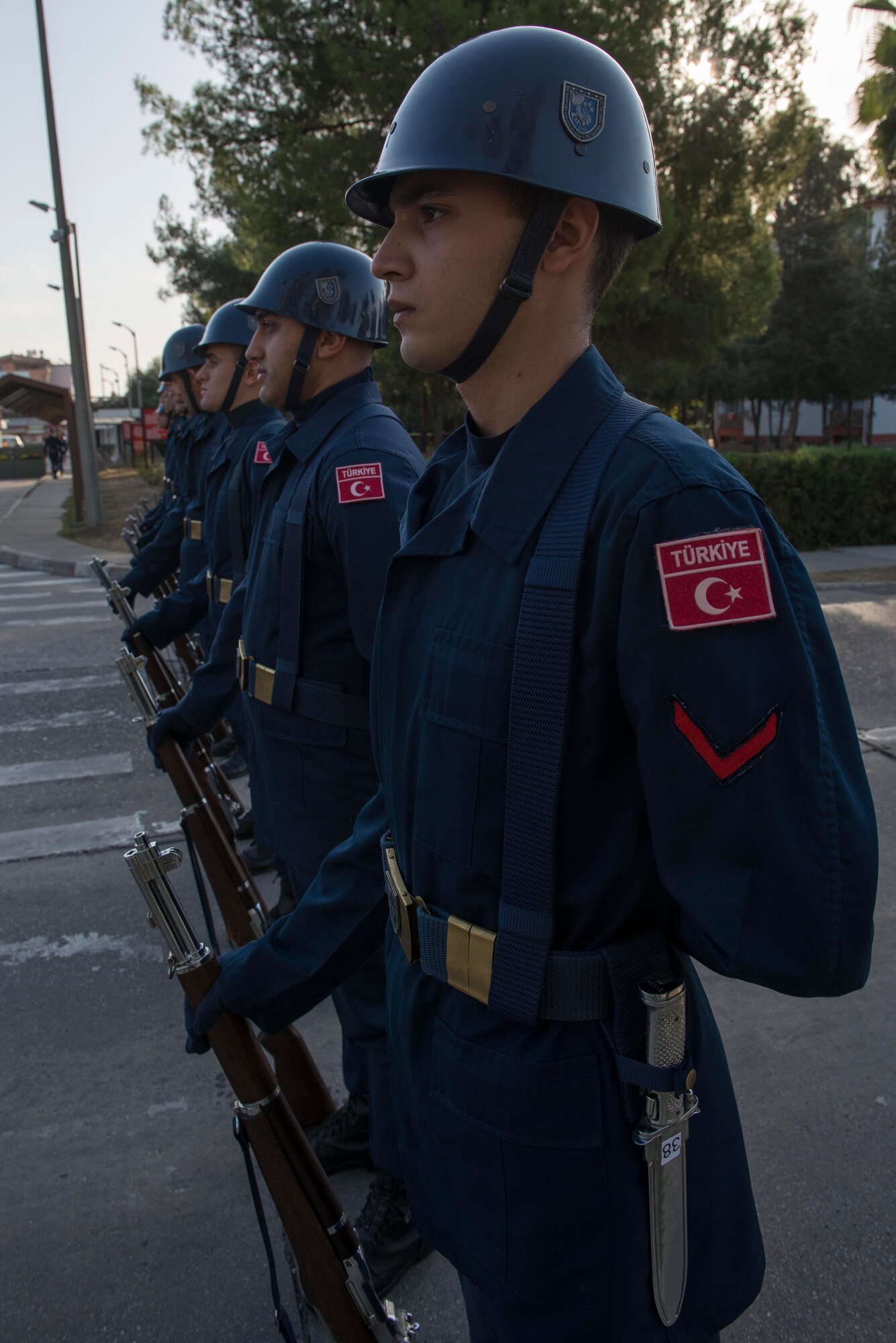 Members of the 10th Tanker Base Command honor guard stand at parade rest during a memorial ceremony for Mustafa Kemal Ataturk Nov. 10, 2016, at Incirlik Air Base, Turkey. The Turkish pay tribute to Ataturk with nation-wide memorial services Nov. 10, annually. (U.S. Air Force photo by Senior Airman John Nieves Camacho)