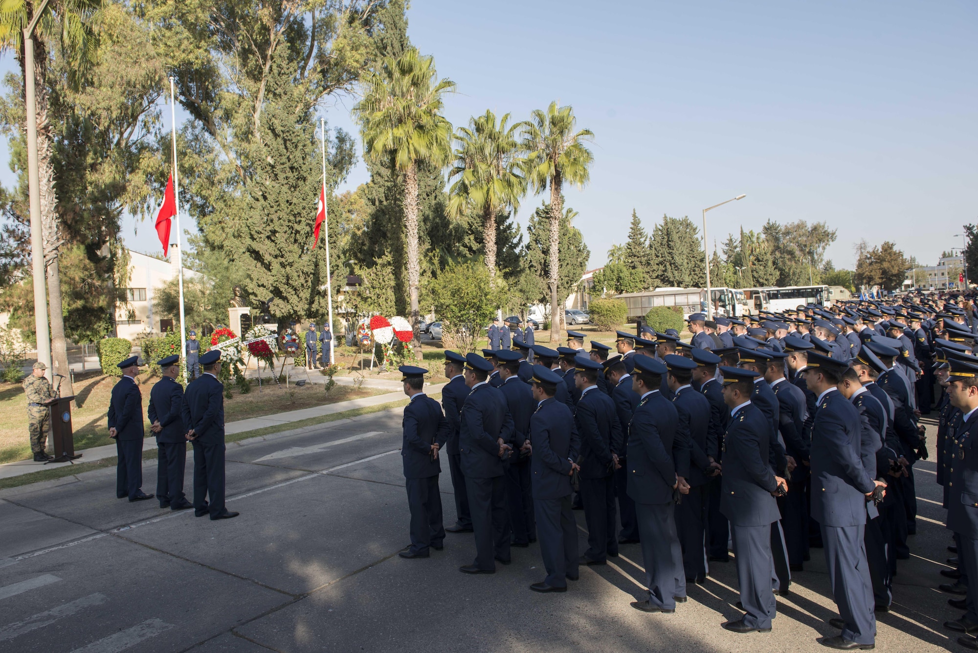 Turkish Air Force members assigned to the 10th Tanker Base and U.S. service members stand at parade rest during a memorial ceremony for Mustafa Kemal Ataturk Nov. 10, 2016, at Incirlik Air Base, Turkey. U.S. and Turkish service members participated in the ceremony to pay tribute and honor Ataturk. (U.S. Air Force photo by Senior Airman John Nieves Camacho)