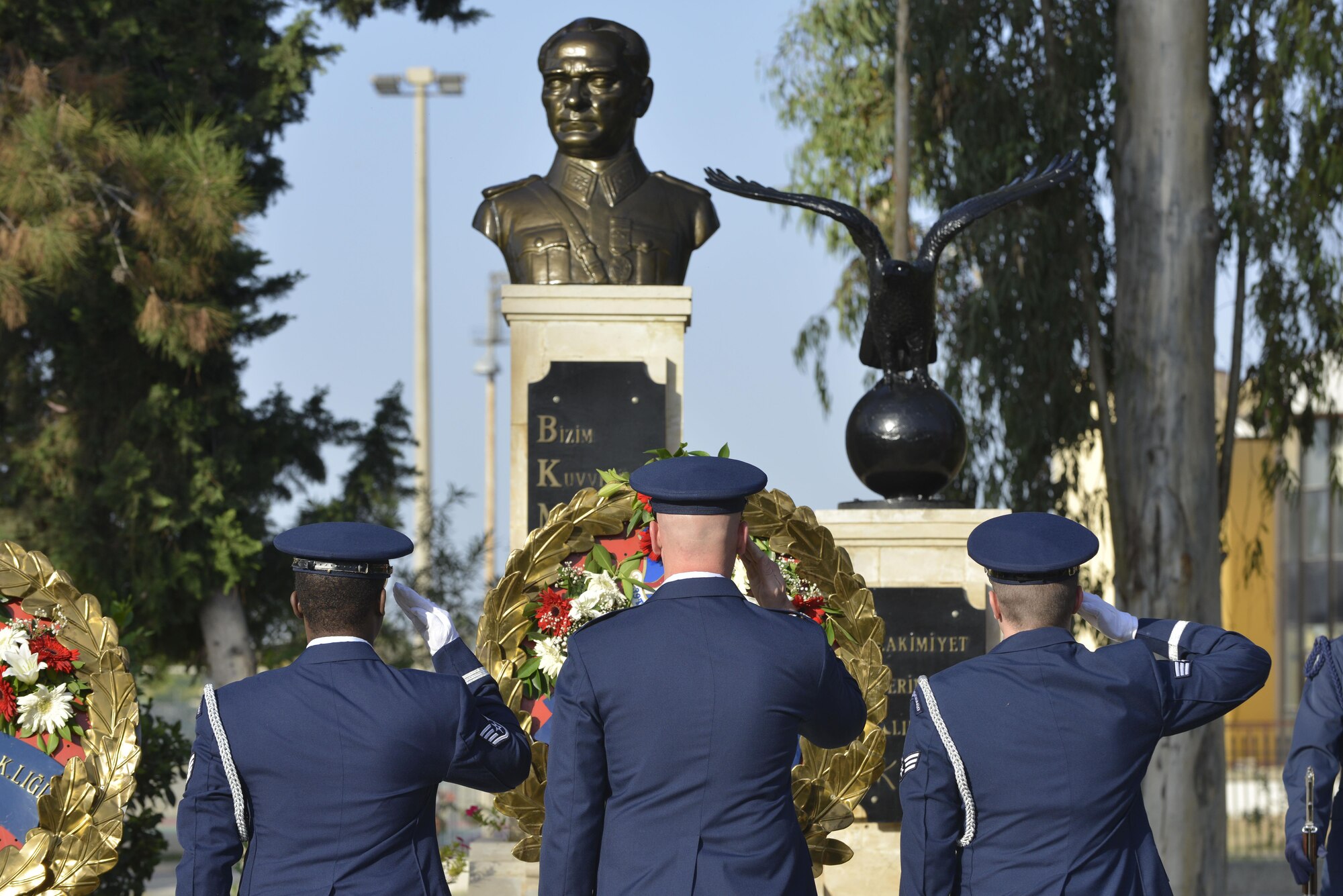 U.S. Air Force Col. Michael Manion, 39th Air Base Wing (ABW) vice commander, along with 39th ABW honor guardsmen, salute a statue of Mustafa Kemal Ataturk during a memorial ceremony Nov. 10, 2016, at Incirlik Air Base, Turkey. U.S. service members were present during the ceremony to show support and respect for Ataturk. (U.S. Air Force photo by Senior Airman John Nieves Camacho)