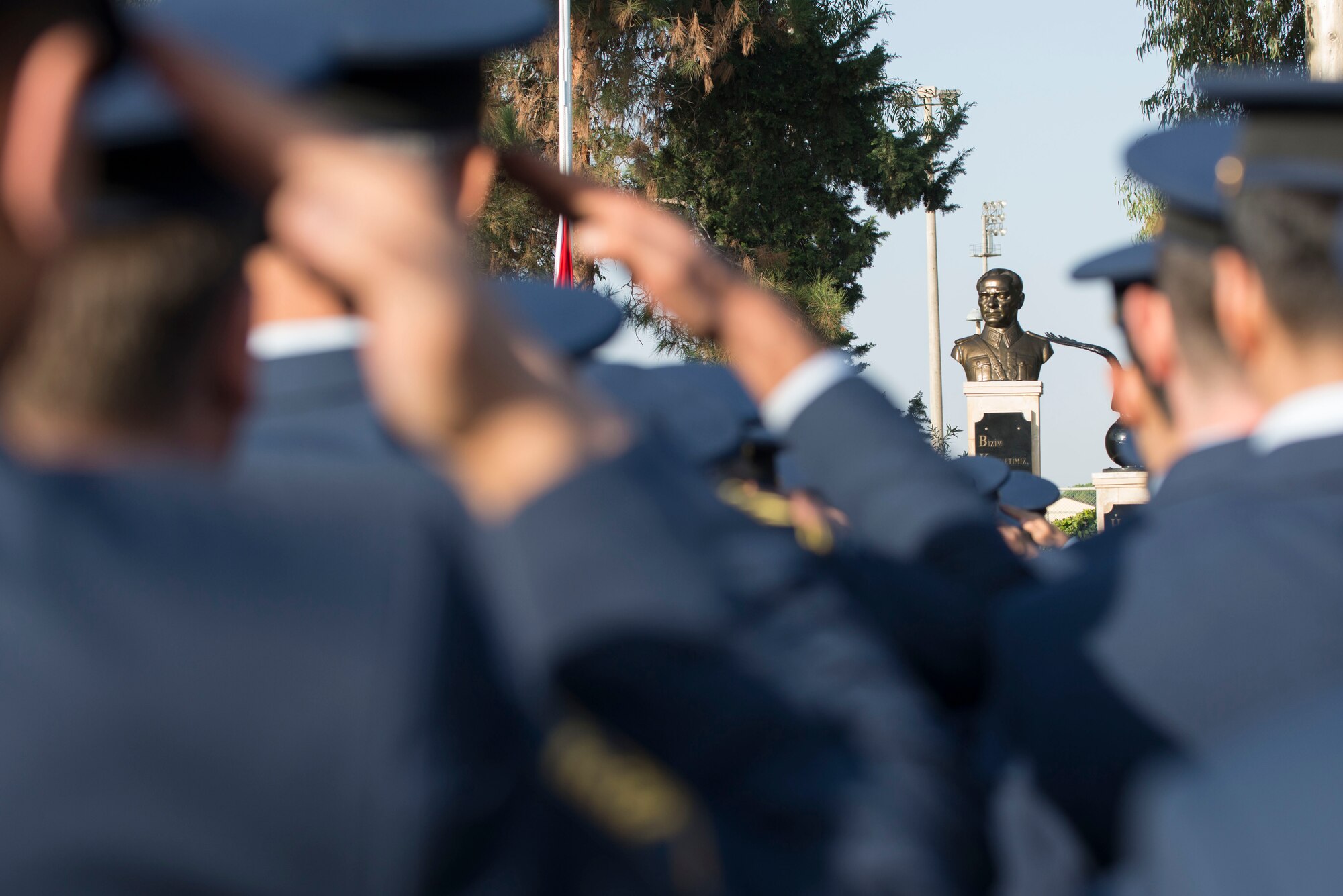 Turkish Air Force members assigned to the 10th Tanker Base salute a statue of Mustafa Kemal Ataturk during a memorial ceremony Nov. 10, 2016, at Incirlik Air Base, Turkey. More than 300 service members gathered for the ceremony to pay homage to Ataturk. (U.S. Air Force photo by Senior Airman John Nieves Camacho)