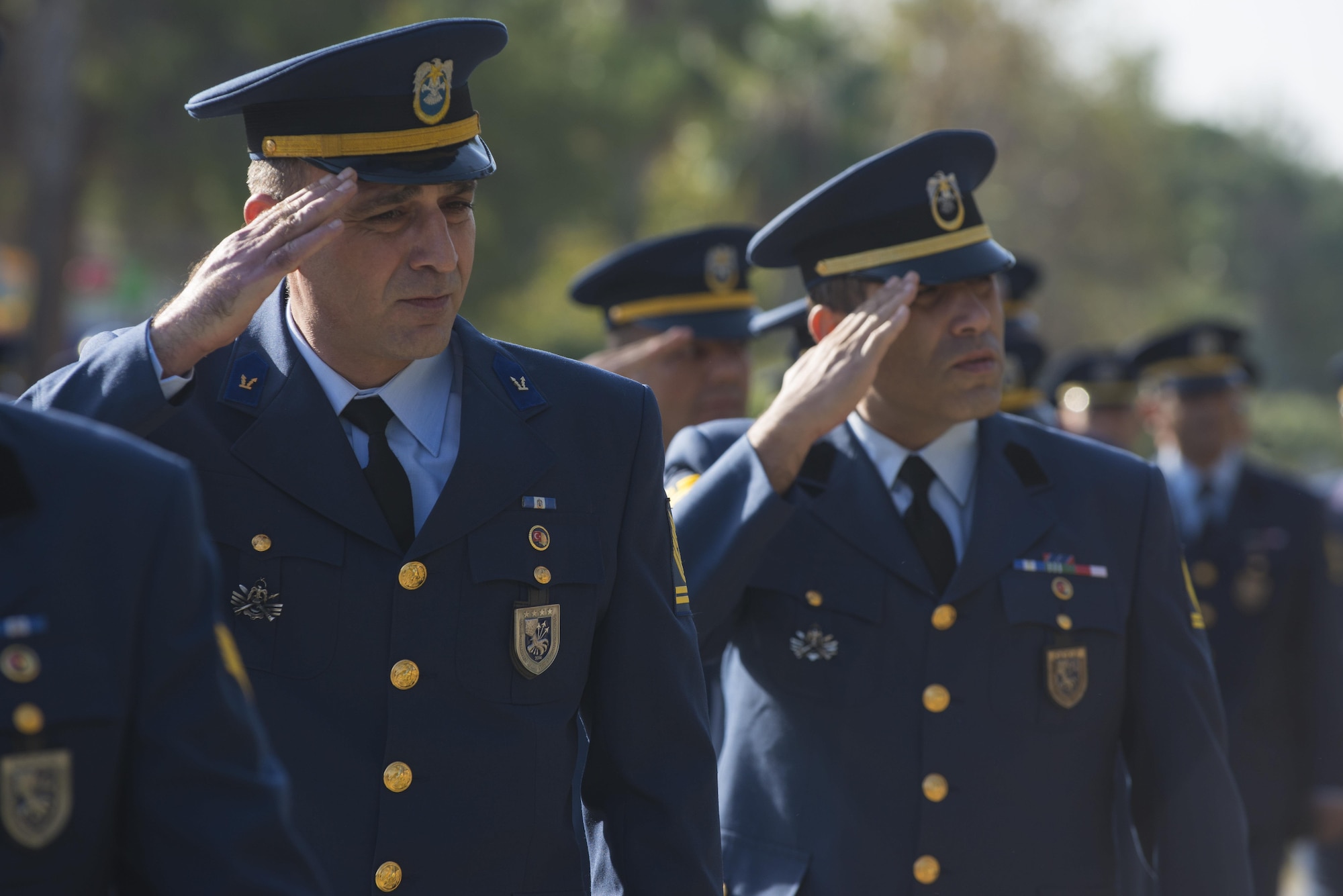 Turkish Air Force members assigned to the 10th Tanker Base render salutes during a memorial ceremony for Mustafa Kemal Ataturk Nov. 10, 2016, at Incirlik Air Base, Turkey. The ceremony concluded with honors rendered to a statue of Ataturk. (U.S. Air Force photo by Senior Airman John Nieves Camacho)