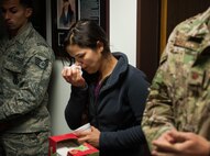 An attendee of the 25th Expeditionary Field Investigation Squadron’s fallen heroes dedication memorial listens as the host reads names of those who lost their lives in the line of duty at Ramstein Air Base, Germany, Nov. 10, 2016. Veteran’s Day is a celebration to honor America's veterans for their patriotism, love of country, and willingness to serve and sacrifice, even if it means their lives. According to a recent Congressional Research Service report, more than 6,500 U.S. servicemembers have lost their lives in post-9/11 conflicts in Iraq and Afghanistan. (U.S. Air Force photo by Airman 1st Class Lane T. Plummer)