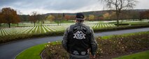 A member of the Ramstein military motorcycle club gazes upon the rows of graves of deceased war veterans at the Lorraine American Cemetery Nov. 11, 2016, at St. Avold, France. Veteran’s Day is observed annually on November 11 and commemorates military veterans who currently serve or have served the U.S. armed forces, including those who gave the ultimate sacrifice. According to the DoD and Veterans Administration, since World War I, approximately 624,000 U.S. servicemembers have been killed in action battling in wars and conflicts. The Lorraine American Cemetery contains the buried remains of over 10,000 of them. It is the largest burial site of U.S. servicemembers in Europe. (U.S. Air Force photo by Airman 1st Class Lane T. Plummer)