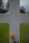 A flower lays on the gravestone of a deceased war veteran at the Lorraine American Cemetery Nov. 11, 2016, at St. Avold, France. Veterans Day is observed annually on November 11 and commemorates military veterans who currently serve or have served the U.S. armed forces, including those who gave the ultimate sacrifice. According to the DoD and Veterans Administration, since World War I, approximately 624,000 U.S. servicemembers have been killed in action battling in wars and conflicts. The Lorraine American Cemetery contains the buried remains of over 10,000 of them. It is the largest burial site of U.S. servicemembers in Europe. (U.S. Air Force photo by Airman 1st Class Lane T. Plummer)