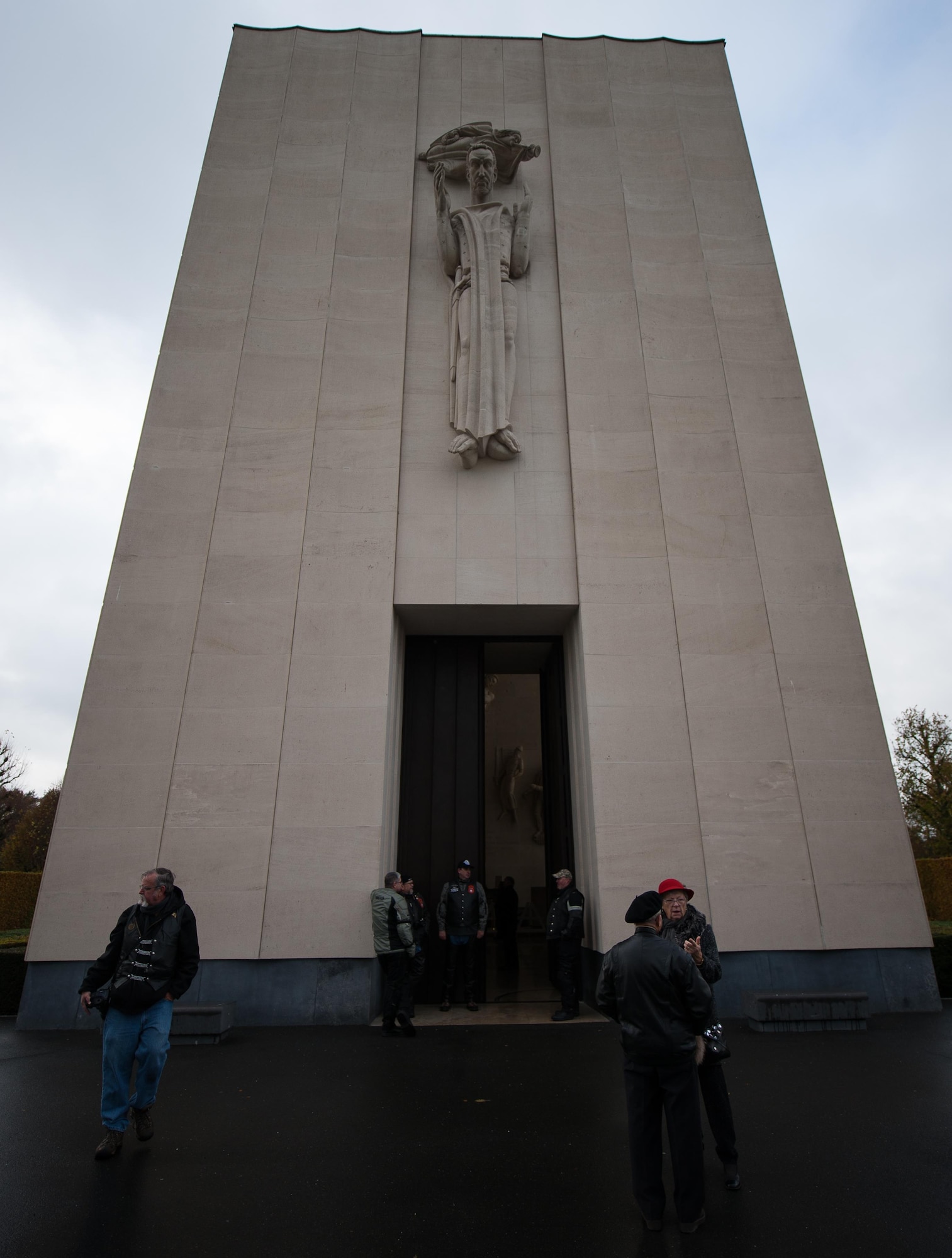 People visit a chapel to pay respects to deceased war veterans at the Lorraine American Cemetery Nov. 11, 2016, at St. Avold, France. Veteran’s Day is observed annually on November 11 and commemorates military veterans who currently serve or have served the U.S. armed forces, including those who gave the ultimate sacrifice. According to the DoD and Veterans Administration, since World War I, approximately 624,000 U.S. servicemembers have been killed in action battling in wars and conflicts. The Lorraine American Cemetery contains the buried remains of over 10,000 of them. It is the largest burial site of U.S. servicemembers in Europe. (U.S. Air Force photo by Airman 1st Class Lane T. Plummer)