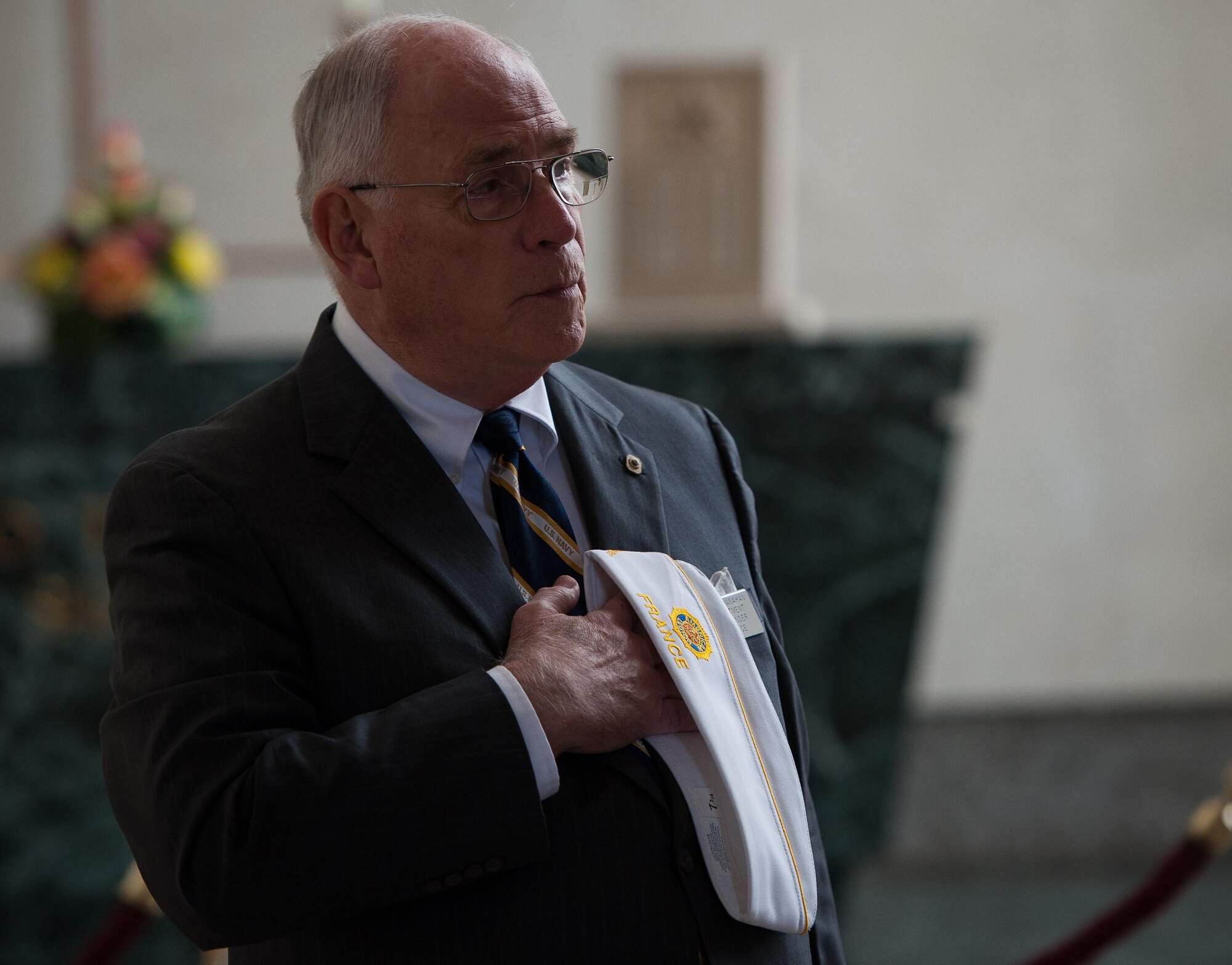 A retired veteran opens a wreath laying ceremony in prayer to honor and pay his respects to the deceased war veterans at Lorraine American Cemetery Nov. 11, 2016, at St. Avold, France. Veteran’s Day is observed annually on November 11 and commemorates military veterans who currently serve or have served the U.S. armed forces, including those who gave the ultimate sacrifice. According to the DoD and Veterans Administration, since World War I, approximately 624,000 U.S. servicemembers have been killed in action battling in wars and conflicts. The Lorraine American Cemetery contains the buried remains of over 10,000 of them. It is the largest burial site of U.S. servicemembers in Europe. (U.S. Air Force photo by Airman 1st Class Lane T. Plummer)