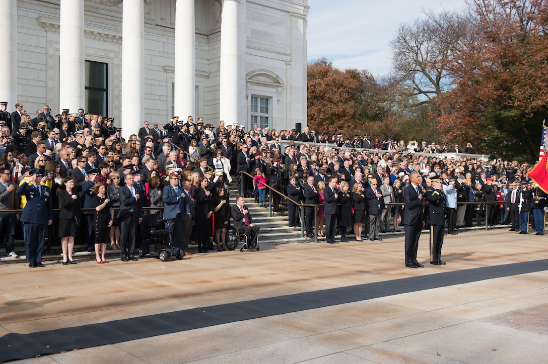 President Barack Obama participates in a Veterans Day wreath-laying ceremony as Defense Secretary Ash Carter, front row, fourth from left, stands by at the Tomb of the Unknown Soldier at Arlington National Cemetery, Va., Nov. 11, 2016. DoD photo by Army Sgt. Amber I. Smith