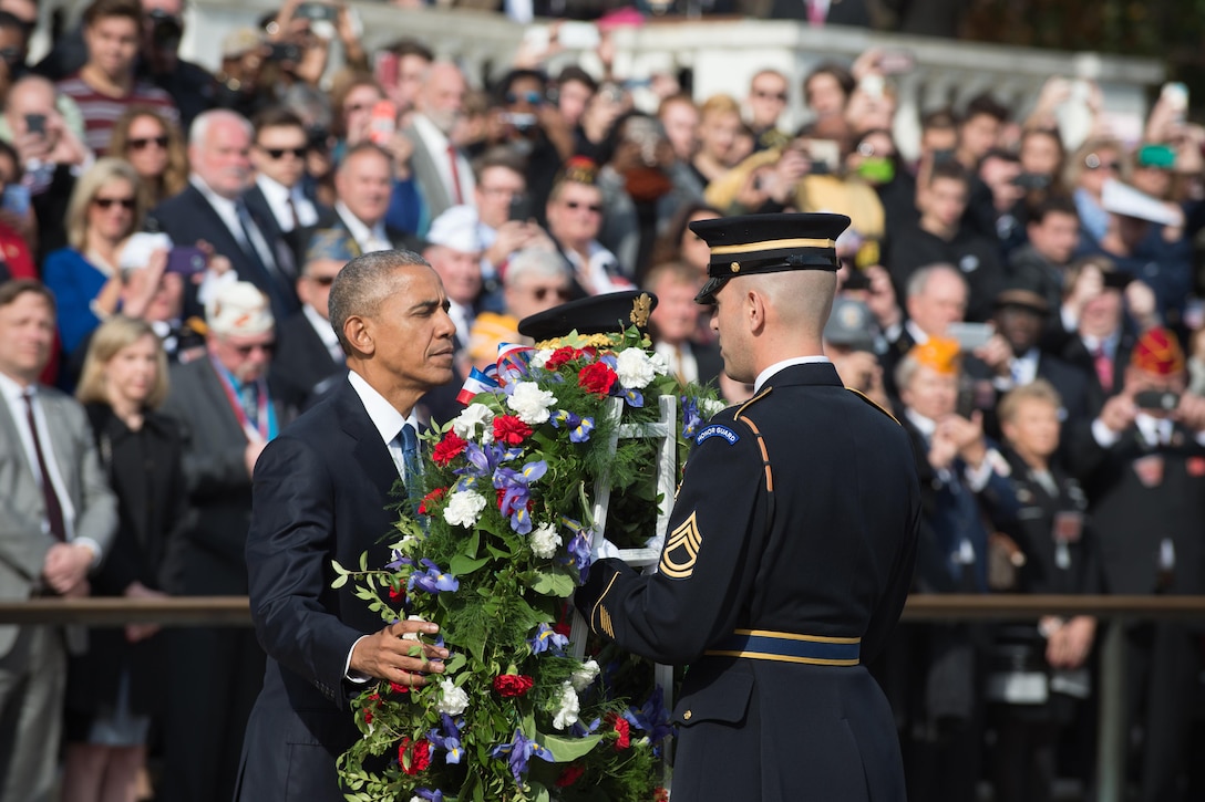 President Barack Obama lays a wreath during a Veterans Day ceremony at the Tomb of the Unknown Soldier at Arlington National Cemetery, Va., Nov. 11, 2016. DoD photo by Army Sgt. Amber I. Smith