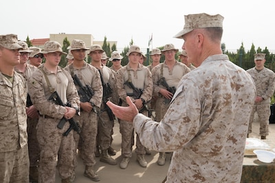 Marine Corps Gen. Joe Dunford, chairman of the Joint Chiefs of Staff, talks with deployed Marines about the importance of the mission in Irbil, Iraq, Nov. 10, 2016. DoD photo by D. Myles Cullen