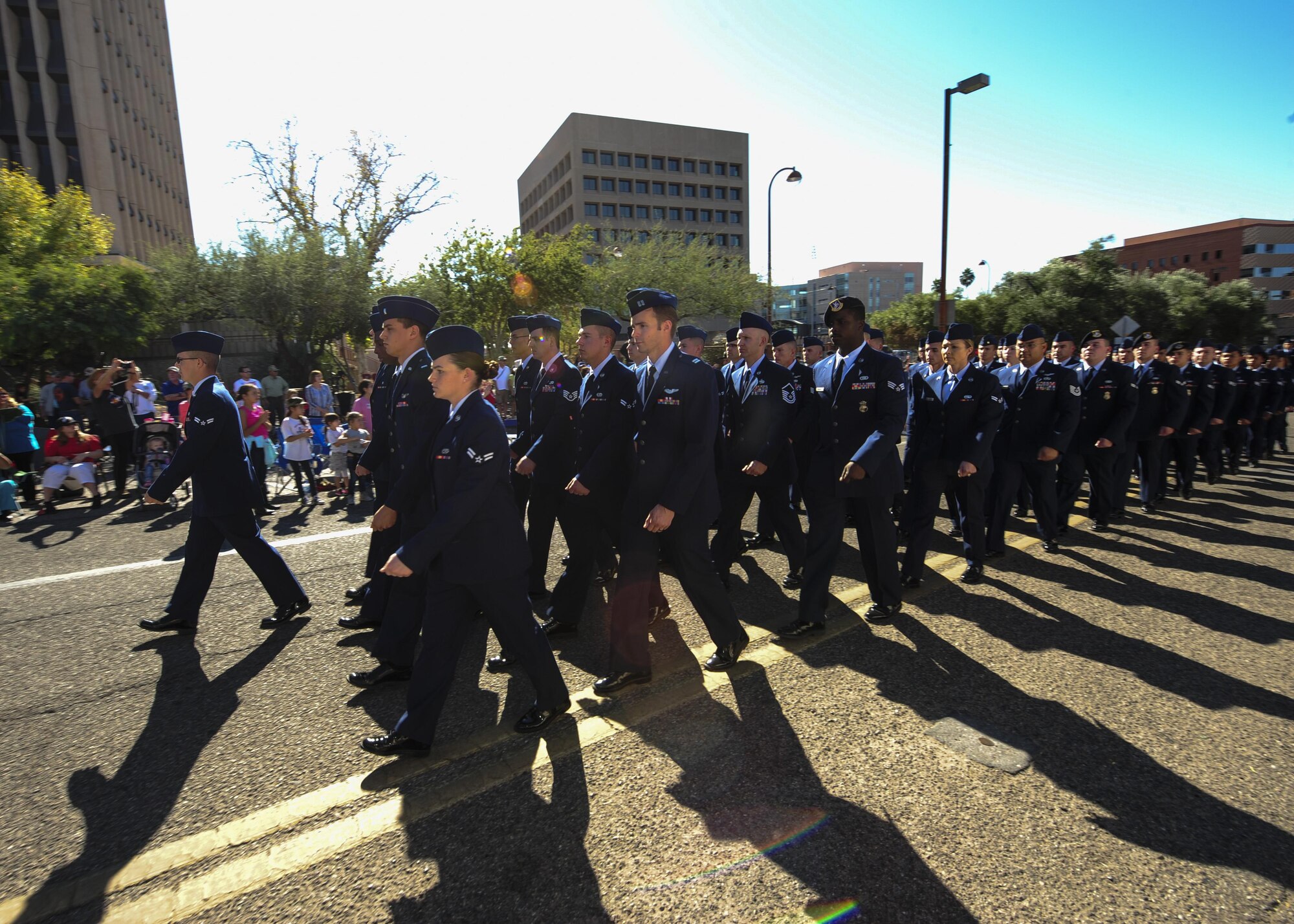 U.S. Airmen from Davis-Monthan Air Force Base march in a formation during the Tucson Veterans Day Parade in Tucson, Ariz., Nov. 11, 2016. More than 100 Airmen participated in the parade, marching approximately two miles in one hour’s time. (U.S. Air Force photo by Airman Nathan H. Barbour)